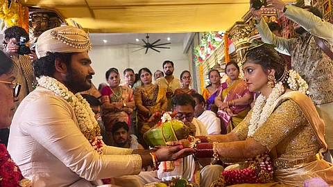 A still of Kiran Abbavaram and Rahasya Gorak from their wedding