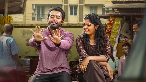 Thalavara second look shows Arjun Ashokan and Revathy Sharma in a lively conversation