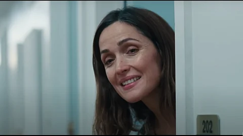 Conan O'Brien helps a struggling Rose Byrne in If I Had Legs I'd Kick You's trailer