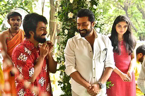 GV Prakash and Suriya in conversation at the pooja ceremony of Suriya 46