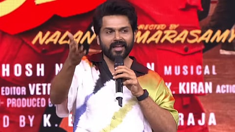 Karthi during the pre-release event of Vaa Vaathiyaar