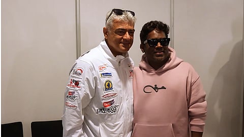 Yuvan Shankar Raja meets with Ajith Kumar at the Dubai Autodrome