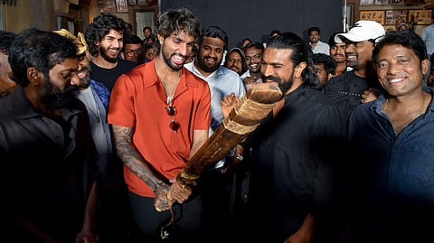Cricketer Tilak Varma visits Peddi sets, checks Ram Charan’s bat