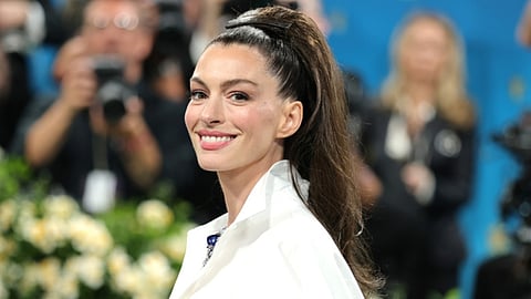 Anne Hathaway says she is currently 'Chipping away at the script' for The Princess Diaries 3