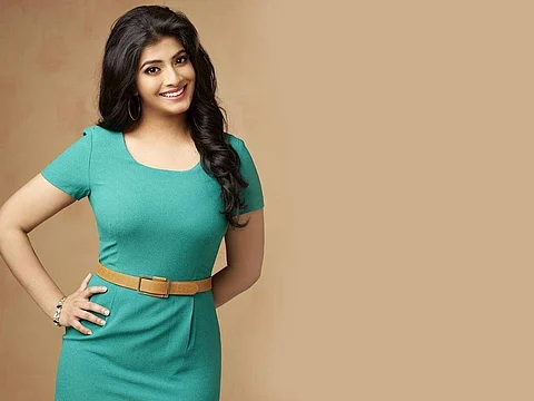 Varalaxmi to share screen space with dad