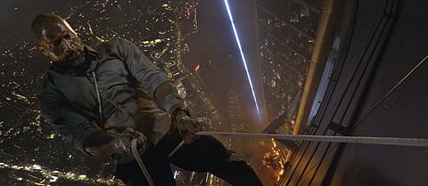Skyscraper Review: An underwhelming, sombre Dwayne Johnson show