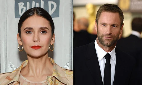 Nina Dobrev and Aaron Eckhart