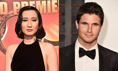 Meng'er Zhang and Robbie Amell