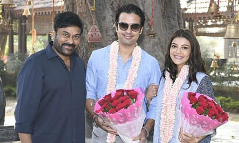 Kajal Aggarwal and husband Gautam Kitchlu with Chiranjeevi on the sets of Acharya