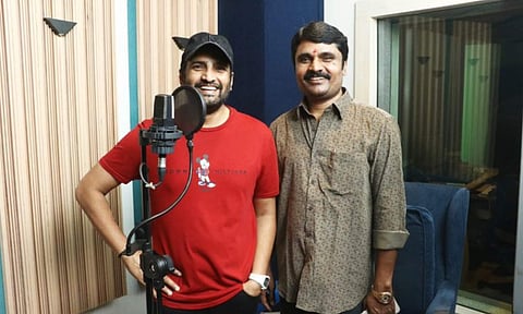 Santhanam begins dubbing for his film with N Anand