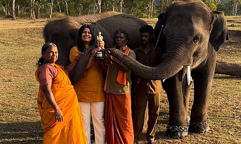 Kartiki Gonsalves shares a photo of The Elephant Whisperers family with Oscar trophy