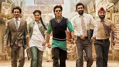 Poster of Dunki, featuring Shah Rukh Khan (centre) and others.