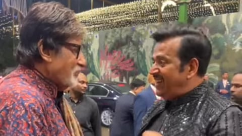 Ravi Kishan and Amitabh Bachchan in a still from the video