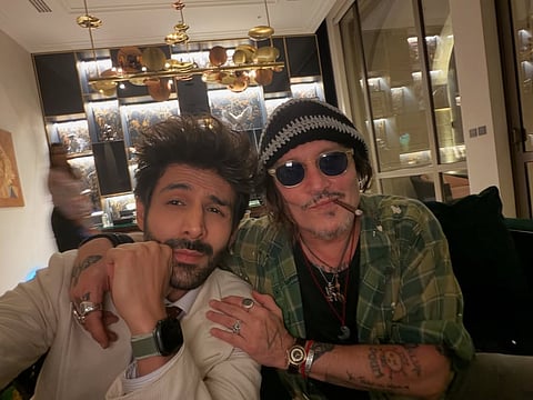 Kartik Aaryan meets Johnny Depp, sparking requests for a crossover