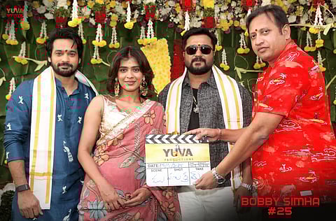 The pooja ceremony of Bobby Simha 25