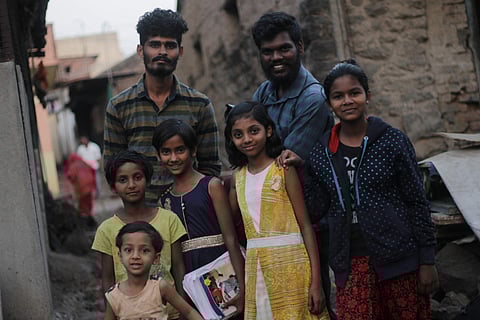 Filmmaker Nithin Anil and cinematographer Priyadarshan with the young cast of A Thing of Magic
