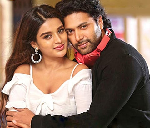 Jayam Ravi and Nidhhi Agerwal in Jayam Ravi's silver jubilee film