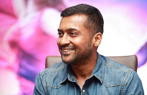 Suriya and Sayyeshaa clicked at the press meet of Kaappaan