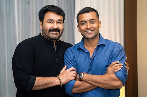 Brand new stills from the Kaappaan press meet 