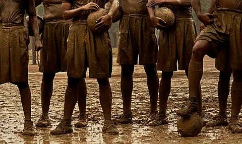 Maidaan poster out: Ajay Devgn and team get down in the mud