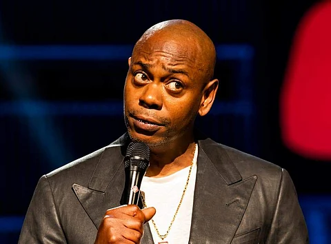 Netflix backs Dave Chappelle's anti-trans comments and suspends a trans employee