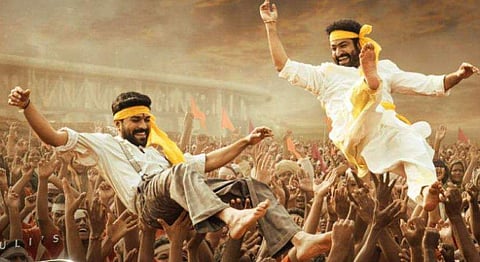 A still of Ram Charan and Jr NTR in RRR