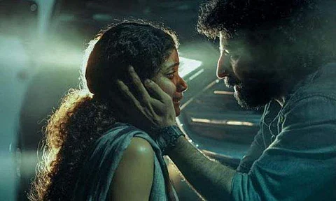 Roshan Mathew and Anna Ben in Night Drive