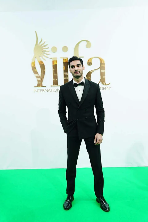 Ahan Shetty, who also won Best Debut Male award for Tadap, looked suave in a black tuxedo.