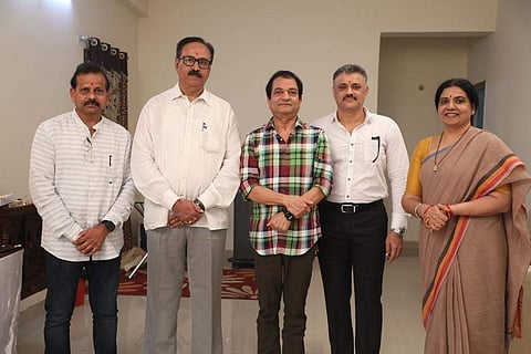 K VIjaya Bhaskar with production team