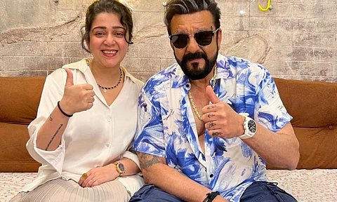 Sanjay Dutt and Charmme Kaur pose from the sets of Double Ismart 