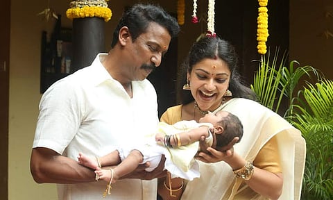 Samuthirakani and Abhirami in a still from Are You Okay Baby